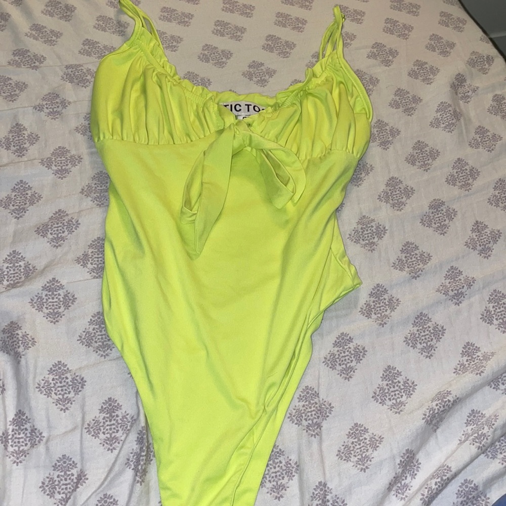 yellow bodysuit